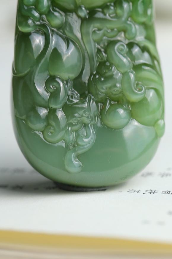 北京唐潮拍賣有限公司扭轉(zhuǎn)乾坤精品和田玉碧玉貓眼掛件