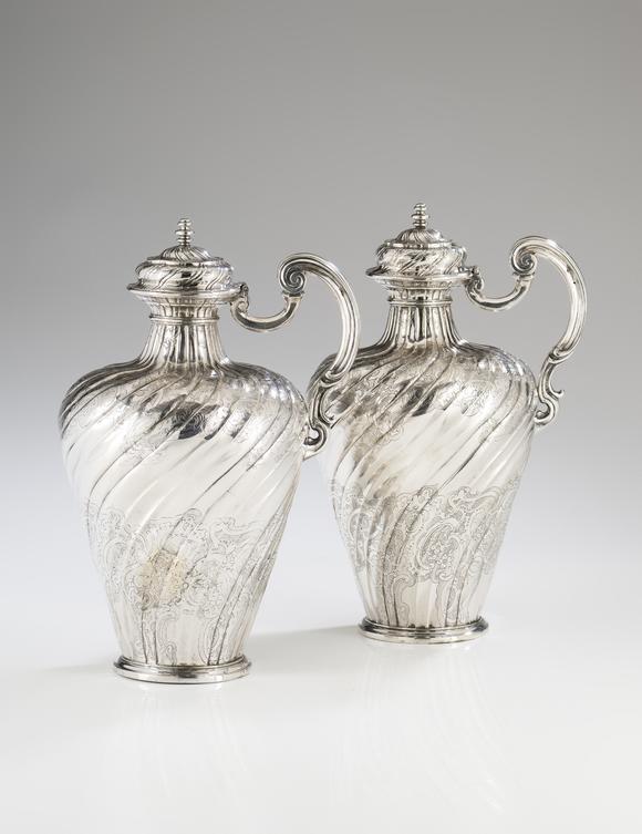 VERITAS Art AuctioneersA pair of Portuguese silver ewers