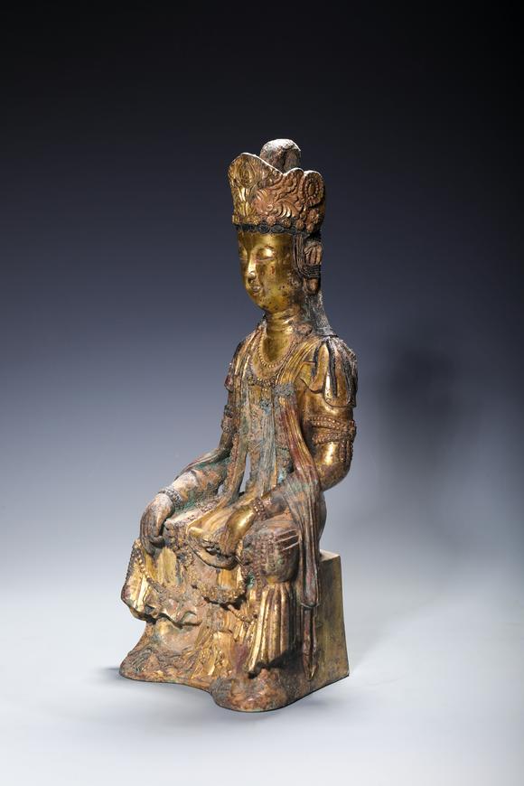 SEAVIEW AUCTIONS PTY LTDA Gilt Bronze Seated Guanyin Bodhisattva, China, 10th–13th centuries