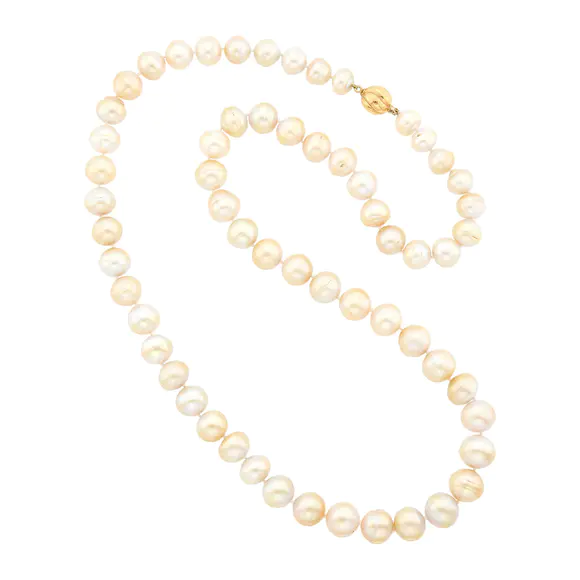 DOYLE Auctioneers & AppraisersLong Semi-Baroque South Sea Cultured Pearl Necklace with Fluted Gold Ball Clasp