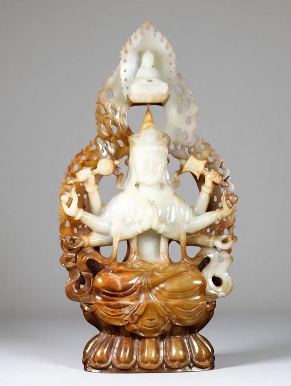 東京蕓術(shù)明 和田玉八臂鏤空佛像