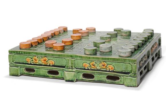 Castle AuctionA Sancai Chinese Chess Board with Chess Pieces, 12th–13th C Pr.
