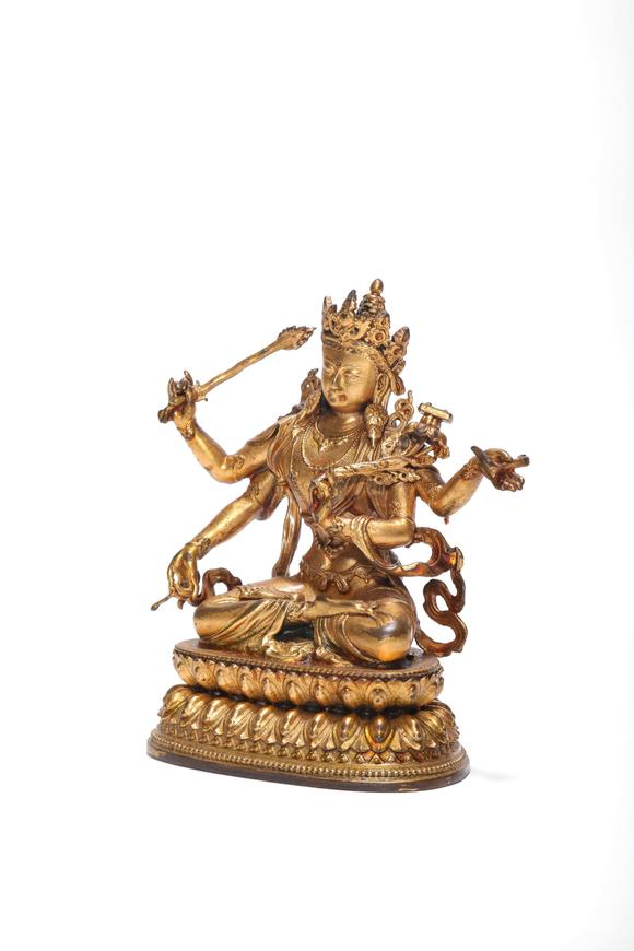 Castle AuctionA Gilt Bronze Four-Armed Manjushri Statue, 18th–19th C Pr.
