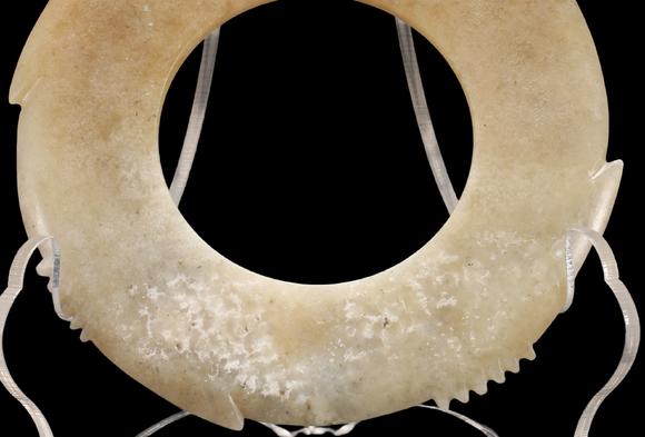 Castle AuctionA Calcified Pale Jade Notched Bi, Late Neolithic, Circa 3300–2300 C BC Pr.
