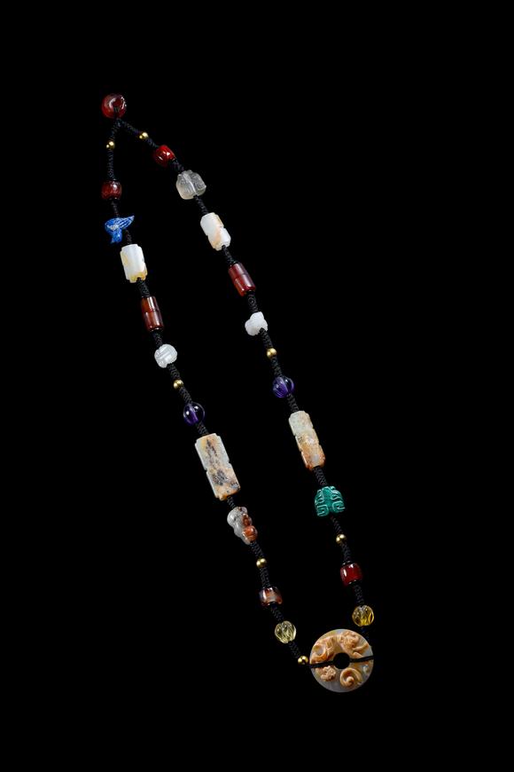 Castle AuctionA Multi-Coloured Hardstone Bead Necklace, Han, Circa 2nd C BC–2nd C AD Pr.