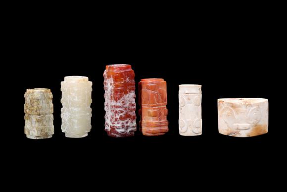 Castle AuctionA Group of Six Calcified & Reddish Jade Cong-Style Beads, Liangzhu, Circa 3300–2300 C BC Pr.