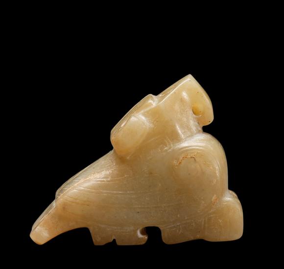 Castle AuctionA Pale Calcified Jade Recumbent Bird Carving, Late Shang, Circa 12th–11th C BC Pr.
