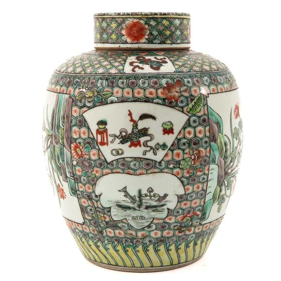 Castle AuctionA famille verte jar with cover