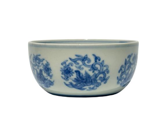 Castle AuctionA Chinese blue-and-white round chi dragon patterned reclining foot cup, Ming Dynasty Pr. 