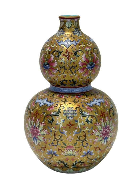 Castle AuctionA Chinese Famille Rose gilt gourd type vase, Qian Long Pr. 