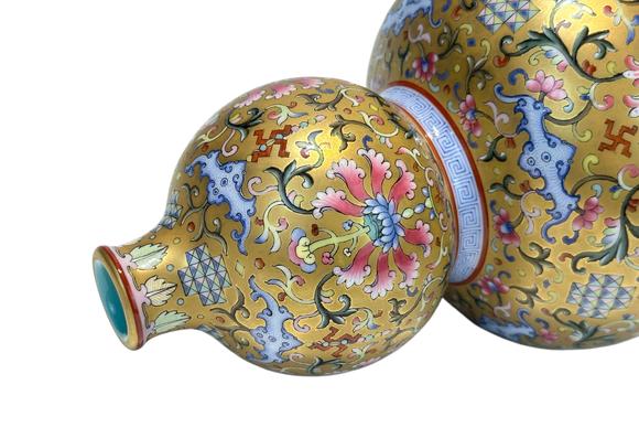 Castle AuctionA Chinese Famille Rose gilt gourd type vase, Qian Long Pr. 