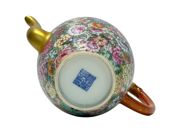 Castle AuctionThe famille rose and flowers décor teapot, Qian Long Pr. 
