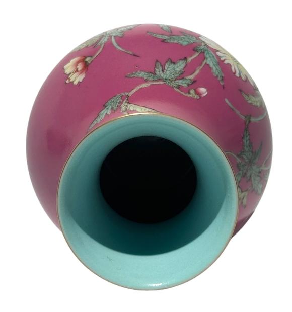 Castle AuctionA Chinese rouge-red ground famille rose vase, Qian Long Pr. 