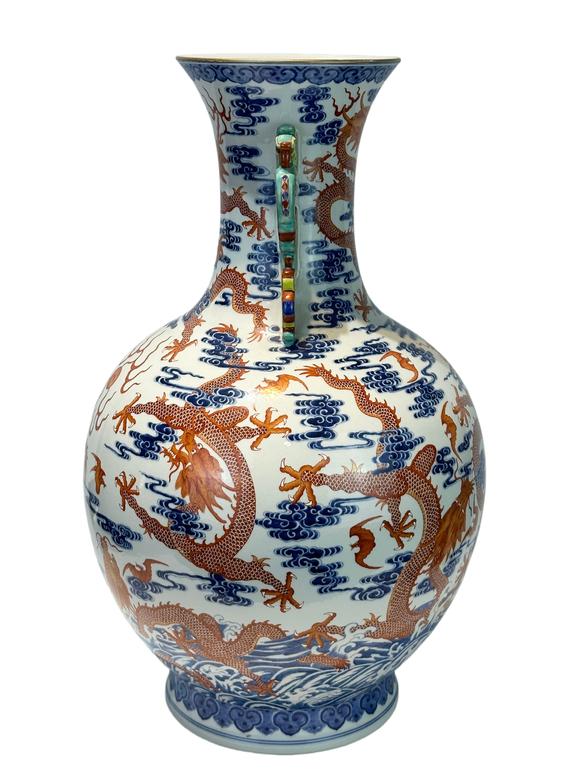 Castle AuctionAn extra large size of vase with double ears, and  cloud dragon patterns, Qian Long Pr. 