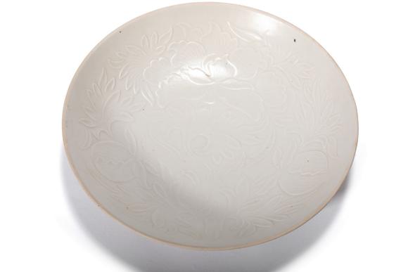 Castle AuctionA Ding Kiln White Glaze Carved Floral Plate, 10th–12th C Pr.