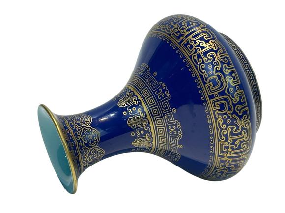 Castle AuctionA Chinese blue ground vase with gilt dragon pattern, Qian Long Pr. 