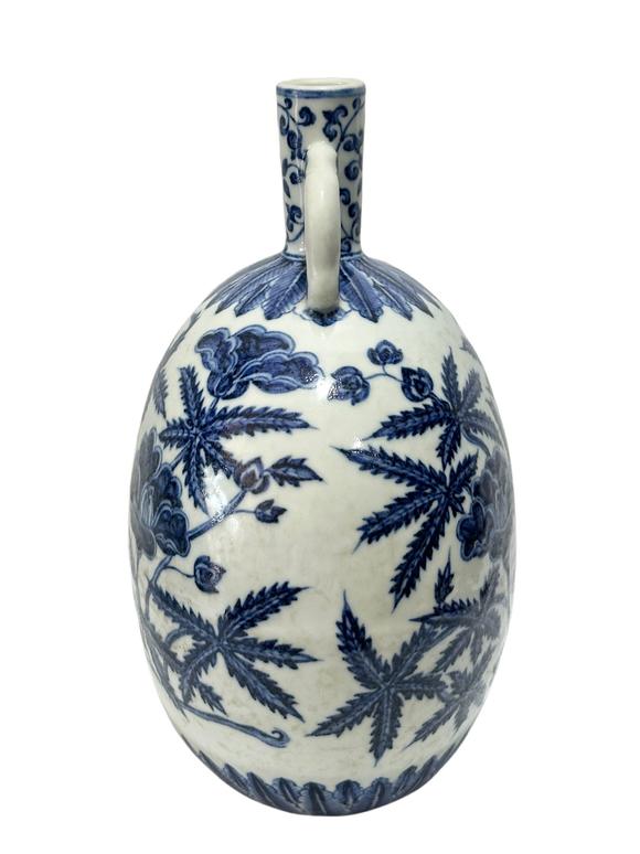 Castle AuctionA Chinese Blue and white okrA Chinese pattern moonflask vase, Ming Dynasty Pr. 