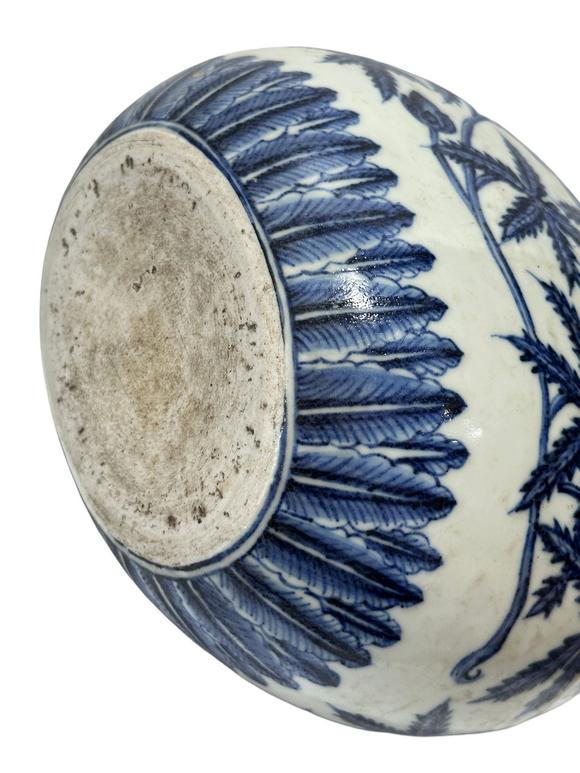 Castle AuctionA Chinese Blue and white okrA Chinese pattern moonflask vase, Ming Dynasty Pr. 