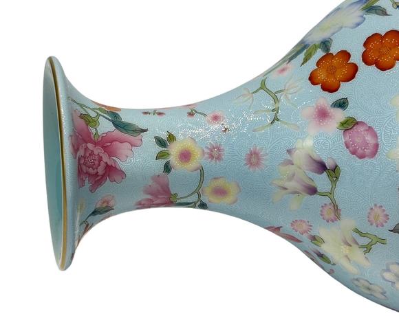 Castle AuctionA Chinese blue-ground Famille Rose vase, Qian Long Pr. 