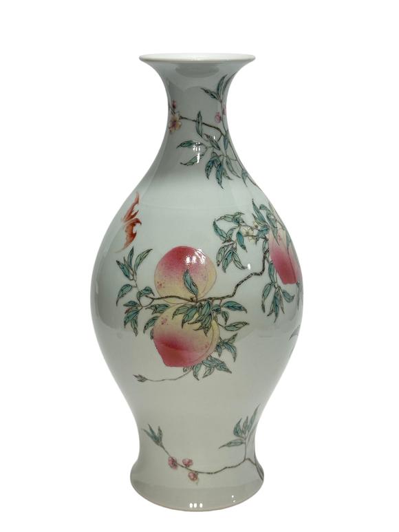 Castle AuctionAn oliva shape famille rose vase, YongZheng Pr. 