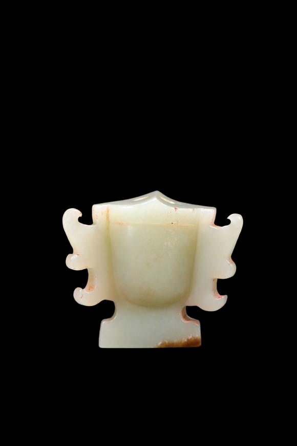 Castle AuctionA Pale Celadon Jade Taotie Mask Pendant, Shang, Circa 13th–11th C BC Pr.