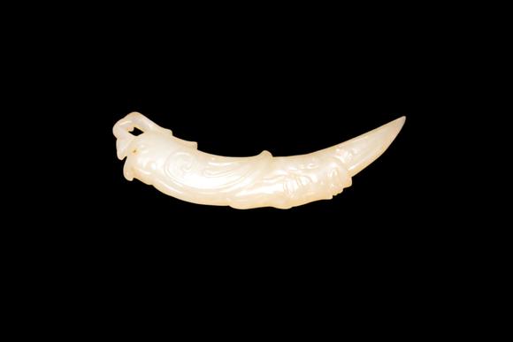 Castle AuctionA Pale Yellow Jade Phoenix Tooth Pendant, Western Zhou, Circa 10th–9th C BC Pr.