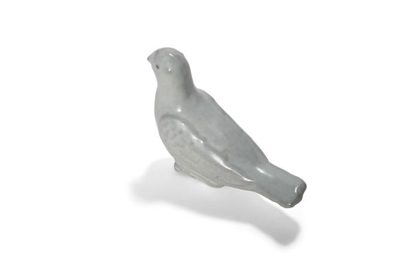 Castle AuctionA White Glaze Bird Figurine, 10th–13th C Pr.