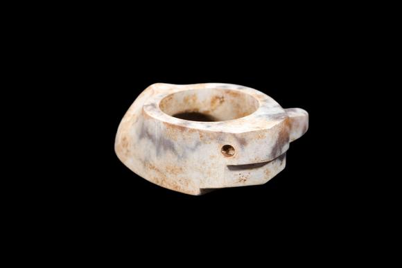 Castle AuctionA Calcified Pale Jade Archer's Ring, Warring States, Circa 475–221 BC Pr.