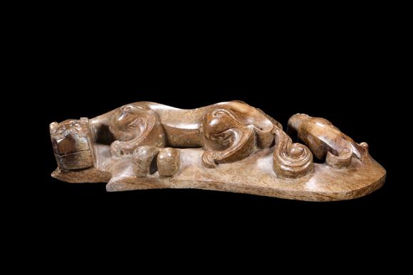 Castle AuctionA Mottled Brown Jade Double Chilong Belt Ornament, Han, Circa 2nd C BC–2nd C AD Pr.