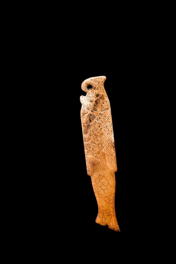 Castle AuctionA Calcified Yellow Jade Fish Pendant, Shang, Circa 13th–11th C BC Pr.