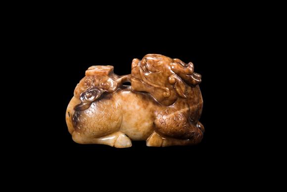 Castle AuctionA Mottled Russet Jade Qilin Carving, Ming, Circa 1368–1644 AD Pr.