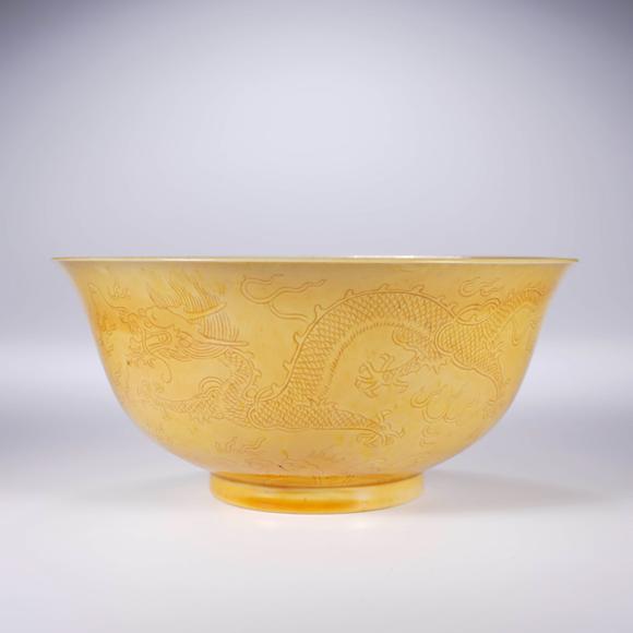Cascade'sDark carved sea dragon bowl with yellow glaze in Guangxu of Qing Dynasty | 清光緒 黃釉暗刻海水龍紋碗