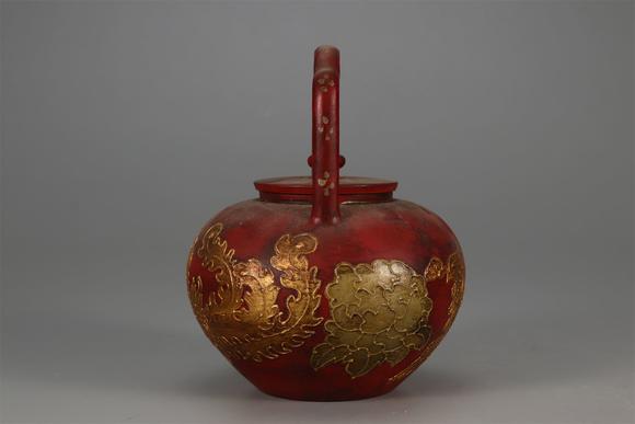 東京國(guó)際拍賣明代 陳用卿 漆器描金鳳紋提梁紫砂壺