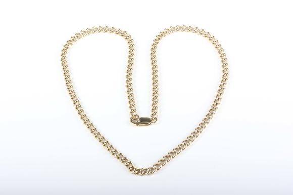 TooveysA gold curblink neckchain, detailed ‘9ct’, on a sprung hook shaped clasp, detailed ‘375’, weight 45.8g, length 55.5cm.