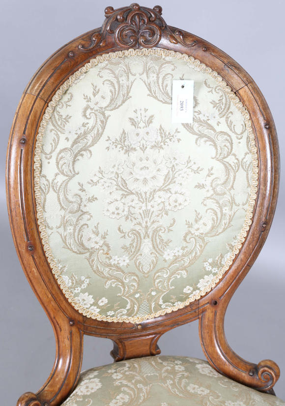 TooveysA mid-Victorian walnut showframe salon chair, height 97cm, width 51cm.