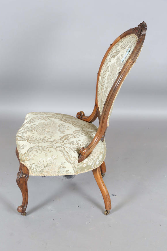 TooveysA mid-Victorian walnut showframe salon chair, height 97cm, width 51cm.
