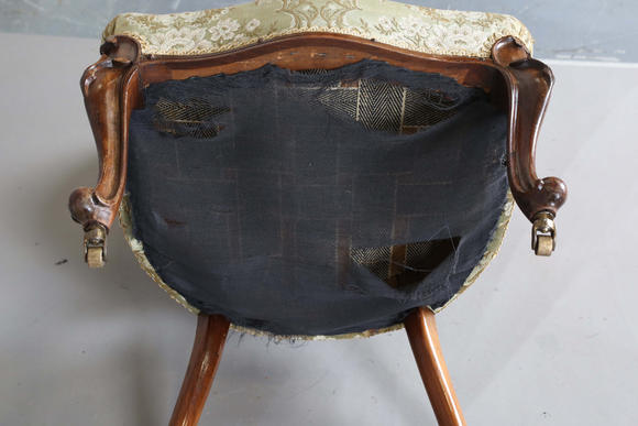 TooveysA mid-Victorian walnut showframe salon chair, height 97cm, width 51cm.