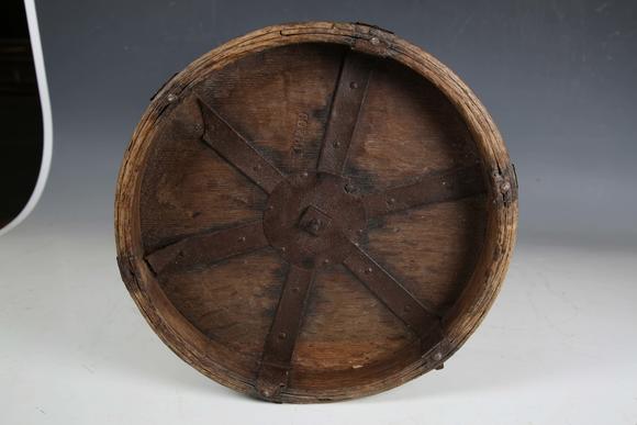 TooveysA 19th century French bentwood and metal bound grain measure, the underside stamped 'CORDIER', height 33cm, diameter 30cm.