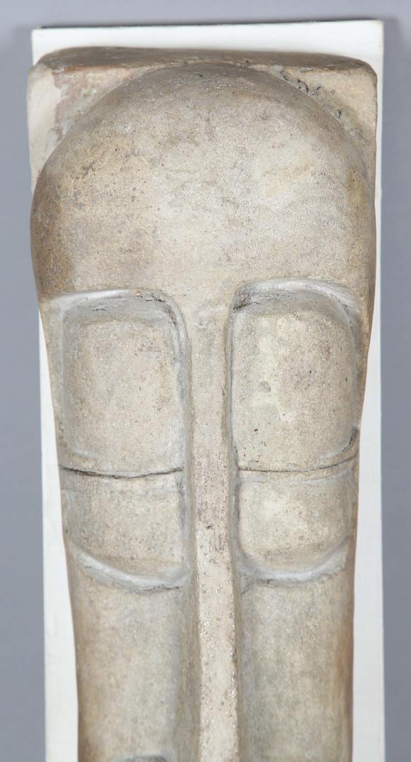 TooveysAttributed to Sidney A. Kumalo - a mid-20th century stoneware/composition wall mounted mask of stylized form, height 60cm, width 16cm, together with r