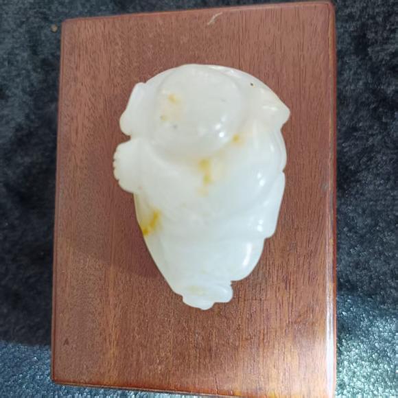 虎符拍賣和田玉持荷童子