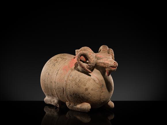 Galerie ZackeA LARGE PAINTED POTTERY ‘RAM’ VESSEL, ZUN, HAN DYNASTY