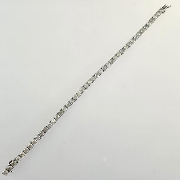 Auktionshaus BlankFeines 14K-Tennisarmband - Wei?gold 585/000 (14 K.), ausgefasst mit
