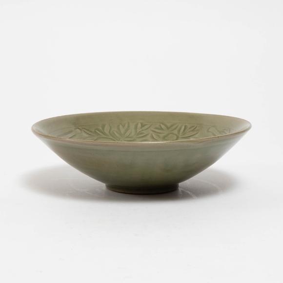 Waddington'sA Carved Yaozhou Celadon 'Double-Ghost' Bowl, Jin Dynasty (1115-1234), 金 耀州青釉'雙鬼獻寶'碗