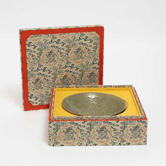 Waddington'sA Carved Yaozhou Celadon 'Double-Ghost' Bowl, Jin Dynasty (1115-1234), 金 耀州青釉'雙鬼獻寶'碗