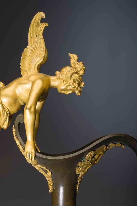 Coronari Auctions BVAn impressive pair of French Empire gilt and patinated bronze ewers on marble bases, attributed to Claude Galle, ca. 1800-1810
