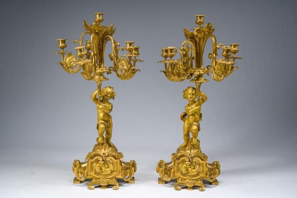 Coronari Auctions BVA fine and exceptional French Napoleon III gilt bronze three-piece clock garniture with putti and floral design, 19th C.