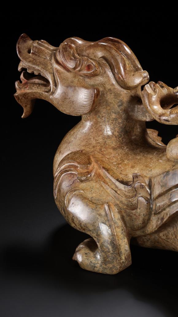 JUBAO HALL AUCTION HOUSE INCPre-Ming Dynasty Feathered Man Taming a Beast