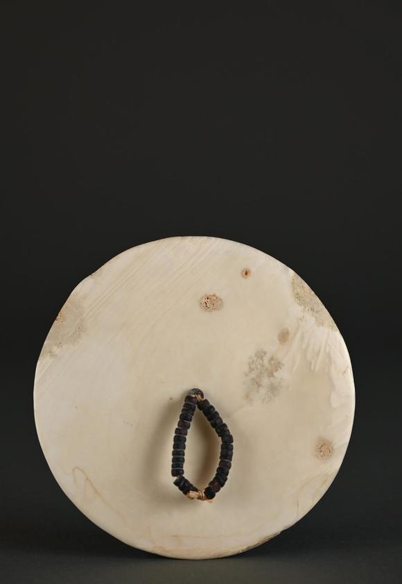 Loeckx AuctioneersKapkap amulet in shell and tortoise, New Guinea, S…