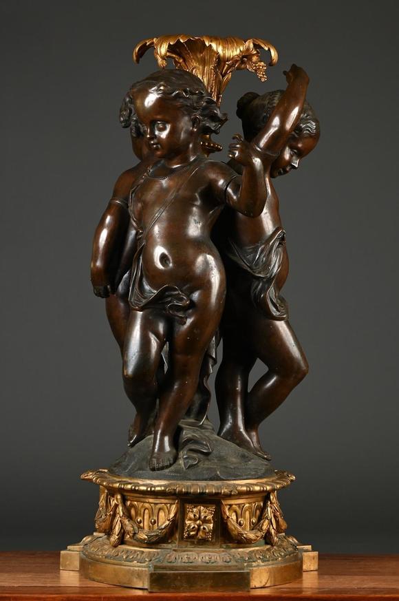 Loeckx AuctioneersA large and fine ornament in bronze \'three putti\',…