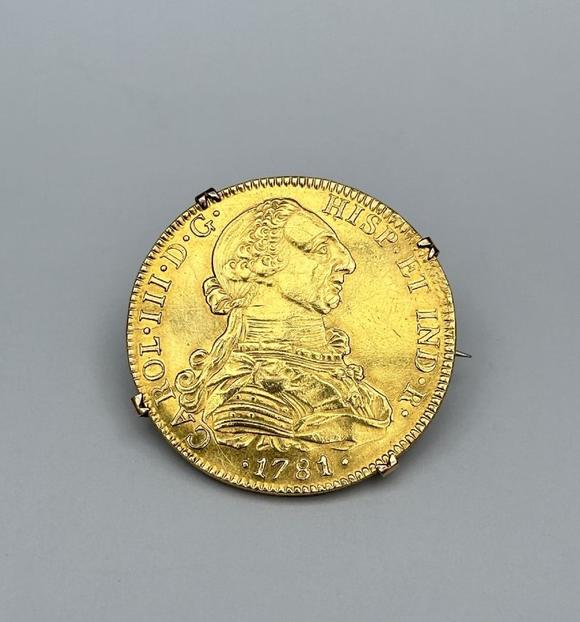 Loeckx AuctioneersCarlos III 1781: Gold coin of 8 Escudos mounted as…